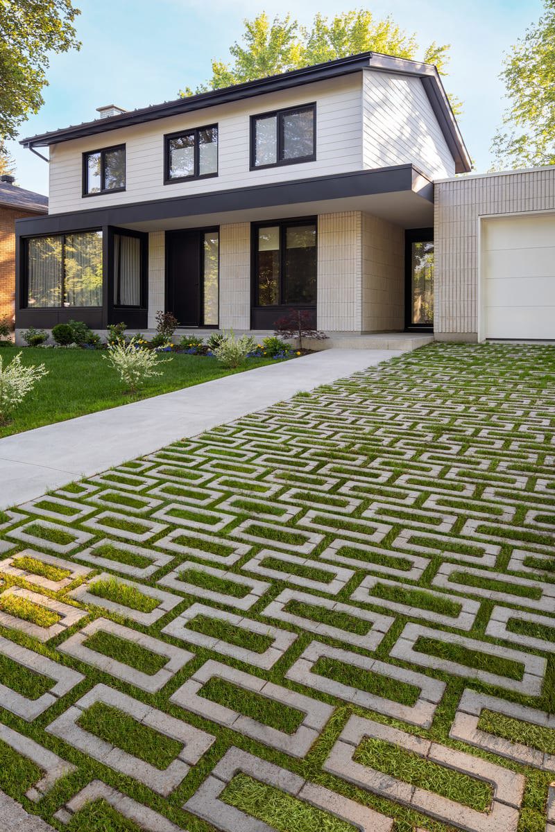 Driveway with permeable pavers installed in a light grey.