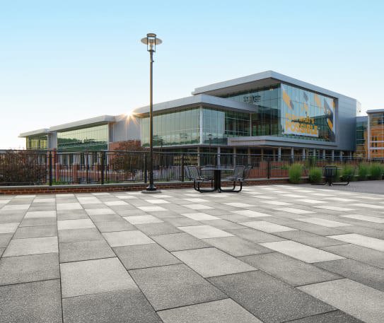 Techo-Bloc&#x27;s Blu Grande Granitex commercial paver installed in a recreational part of Towson University&#x27;s campus.