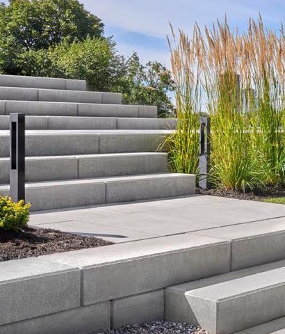 Raffinato stone steps by Techo-Bloc create an outdoor staircase in front of a public building