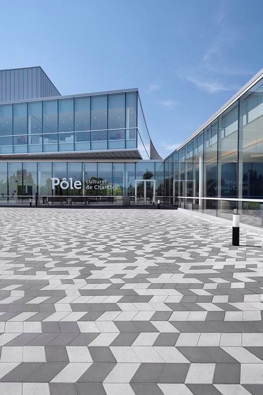 View of front of building of Chambly Public Library featuring Techo-Bloc Diamond Pavers in Greyed Nickel and Onyx Black.