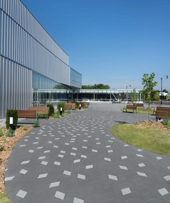 Techo-Bloc Diamond Pavers in Greyed Nickel and Onyx Black installed at Chmably Public Library in Quebec