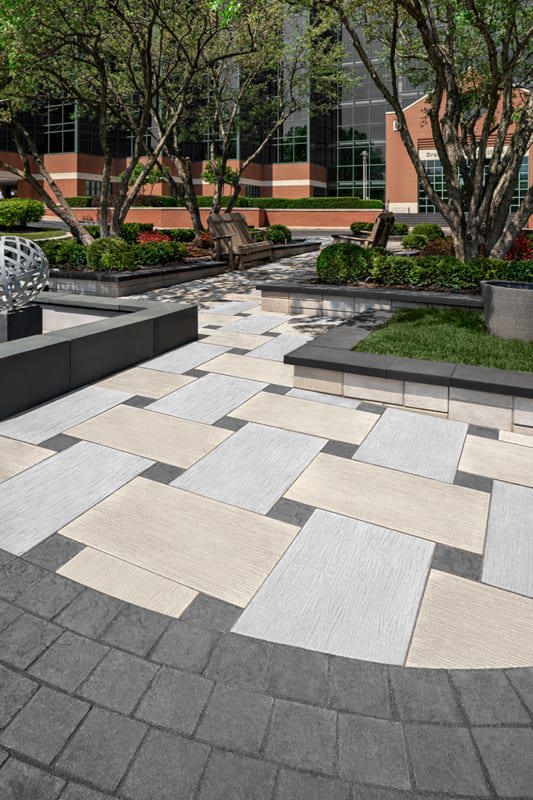 Office Courtyard designed with Techo-Bloc&#x27;s Ocean Grande Slab and Valet Paver.