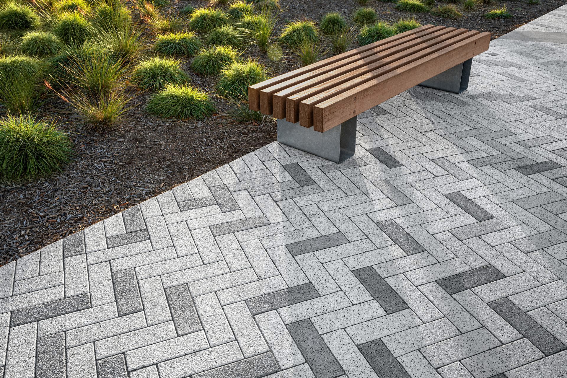 Detailed view of the mosaic pattern created using Techo-Bloc Industria Granitex Paver at Unity Park in Greenville, South Carolina.